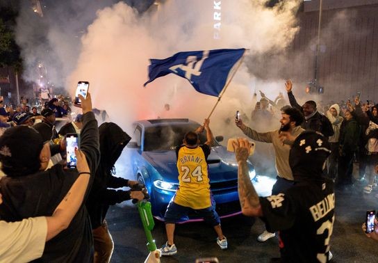 Image for story: Los Angeles sees bus burned, store thefts and rowdy crowds after Dodgers win World Series