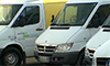 Photo of delivery trucks marked with the words "powered by biofuel"