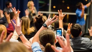 Student's raising hands