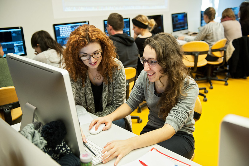 Several students sitting at computers