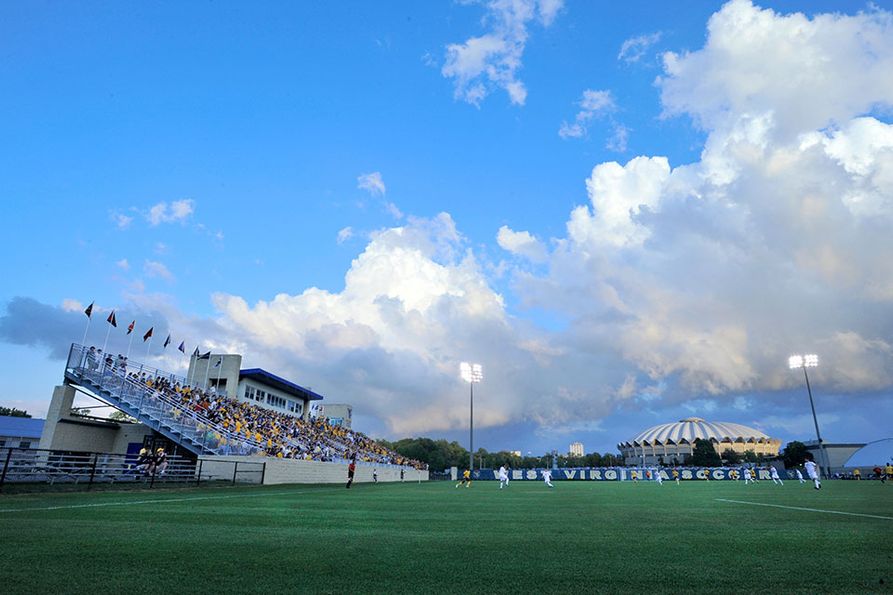 Spectator seating and playing field