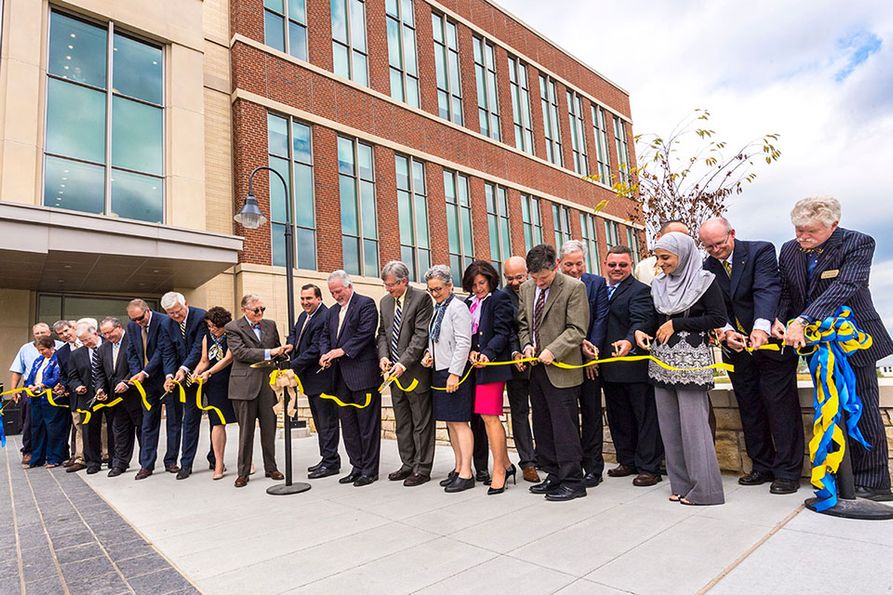 Cutting ribbon at Agricultural Sciences