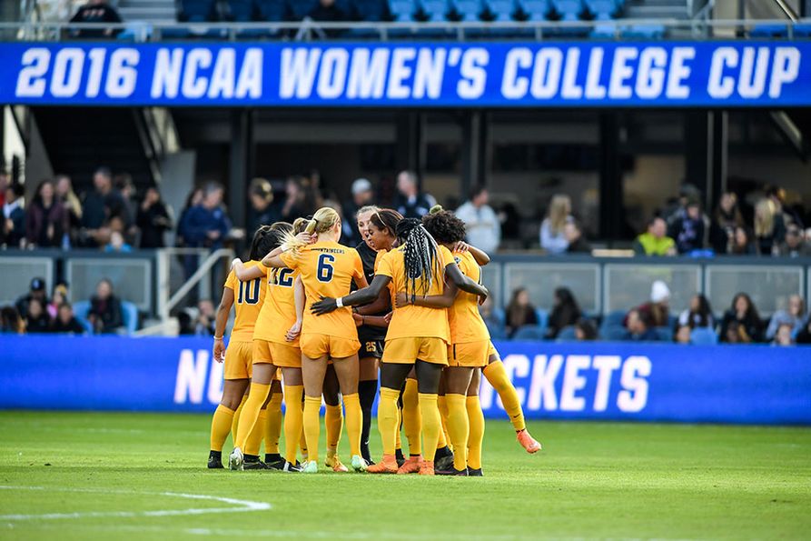 Players huddle at College Cup