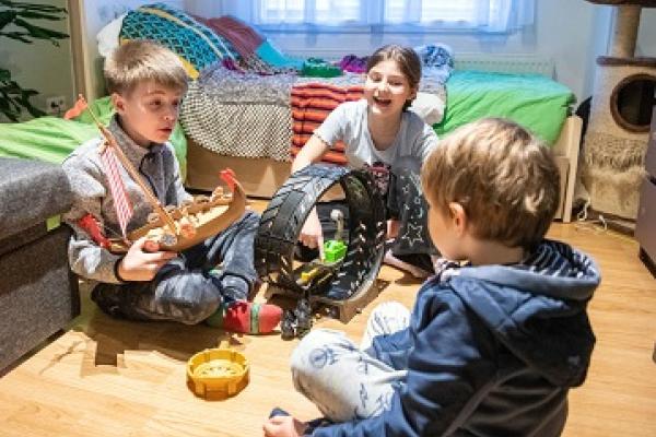 Three children playing together