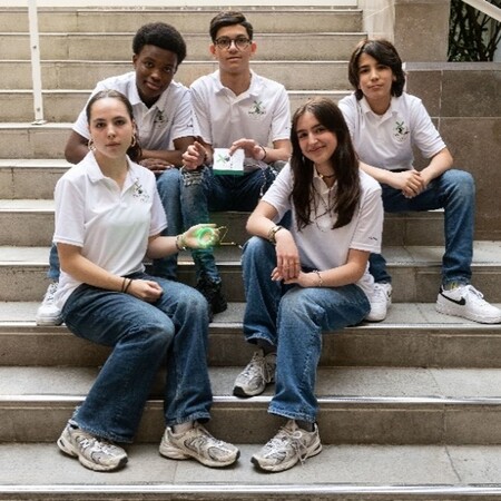 Students holding their portable mini charger