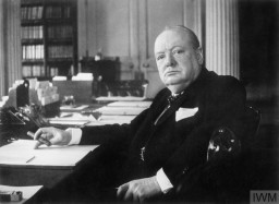 British Prime Minister Winston Churchill sits in the Cabinet Room at 10 Downing Street. London, 1940. IWM (MH 26392)