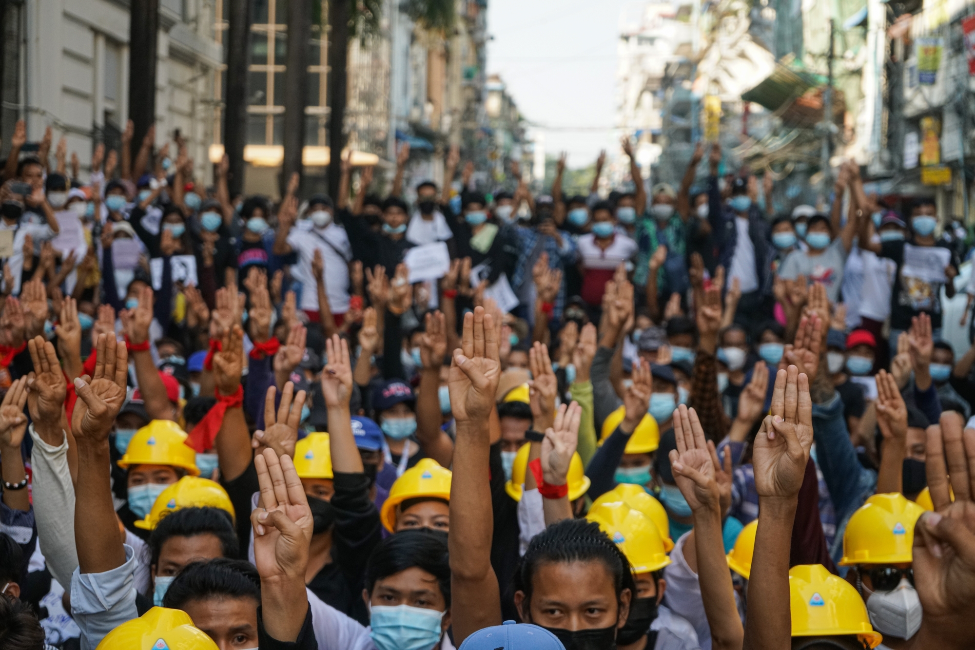 People gather in Myanmar to protest the February 1, 2021 military coup. (Image credit: Stringer/Anadolu Agency via Getty Images)