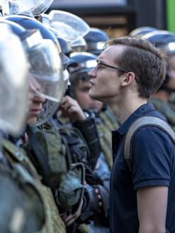 Police confrontation with civilians, as people are trying to get to the protest on Tverskaya Street.  Moscow, Russia. 27 July, 2019. Editorial credit:  Aleksandr Beliakov / Shutterstock.com