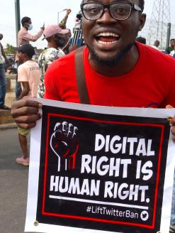 A demonstrator in Lagos holds a sign advocating for digital rights amidst nationwide protests over the Nigerian government's Twitter ban. Image credit: PIUS UTOMI EKPEI/AFP via Getty Images