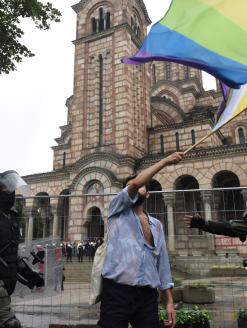 A person waves a flag during the European LGBTQ pride march in Belgrade, Serbia, September 17, 2022. 