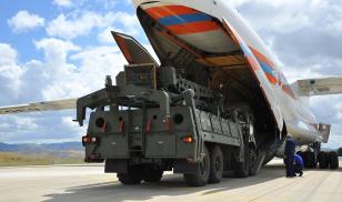 Russian Ilyushin Il-76, carrying the first batch of equipment of S-400 missile defense system, arrives at Murted Air Base in Ankara, Turkey. Photo by Turkeys National Defense Ministry / Handout/Anadolu Agency/Getty Image.