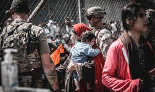 Afghan refugees wait for evacuation at Hamid Karzai International Airport during Operation Allies Refuge in Kabul, Afghanistan on August 22, 2021.