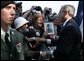 President George W. Bush meets with veterans and their families after delivering remarks during ceremonies marking the 60th anniversary of D-Day at the American Cemetery in Normandy, France, June 6, 2004. White House photo by Paul Morse.