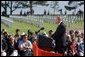 President George W. Bush addresses World War II veterans and families during the 60th anniversary of D-Day at the American Cemetery in Normandy, France, June 6, 2004.  White House photo by Paul Morse