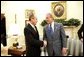 President George W. Bush shakes hands with Prime Minister Peter Medgyessy of Hungary at the end of their meeting in the Oval Office, Tuesday, June 22, 2004.   White House photo by Eric Draper