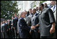 President George W. Bush greets members of the Indianapolis Colts football team at the White House ceremony to honor the Super Bowl XLI champions Monday, April 23, 2007. White House photo by Eric Draper