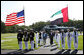 President George W. Bush walks through an honor guard with Sheikh Mohammed bin Rashid al-Maktoum, Prime Minister of the United Arab Emirates and ruler of Dubai, Sunday, Aug. 3, 2008 in Camp David. White House photo by Eric Draper