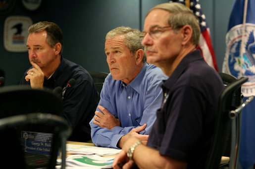 President George W. Bush, joined by Federal Emergency Management Agency Administrator David Paulison, left, and Deputy Administrator Harvey Johnson, right, participates in a briefing on preparations for Hurricane Gustav, at the FEMA National Response Center, Sunday, August 31, 2008 in Washington, DC. White House photo by Chris Greenberg