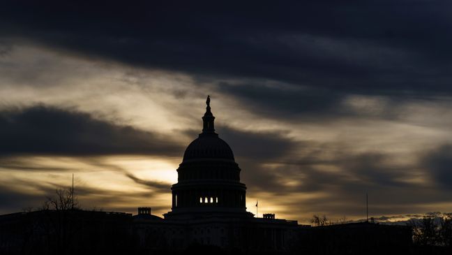 The Capitol is seen in Washington, early Friday, Dec. 17, 2021, after President Joe Biden said last night he was unable to come to an agreement with Sen. Joe Manchin, D-W.Va., a centrist Democrat vital to the fate of the Democrat's expansive social and environment bill. (AP Photo/J. Scott Applewhite)