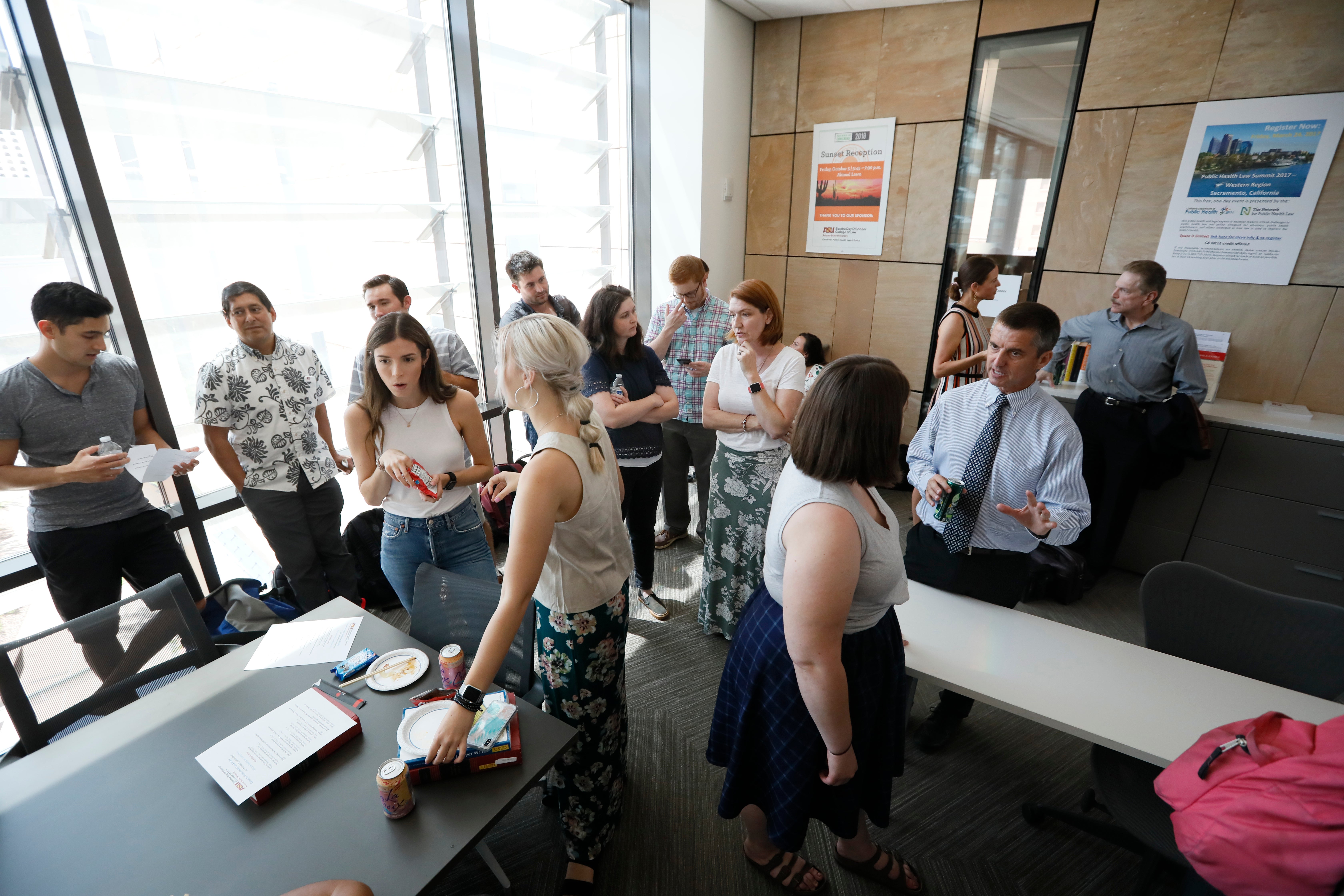 Public Health Law student gathering together in classroom with Professor James Hodge Jr.