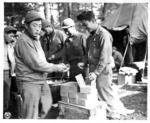 Japanese-American troops of the 100th Infantry Battalion, 442nd Regiment, US 34th Infantry Division resting in bivouac in Chambois Sector, France, 12 Oct 1944