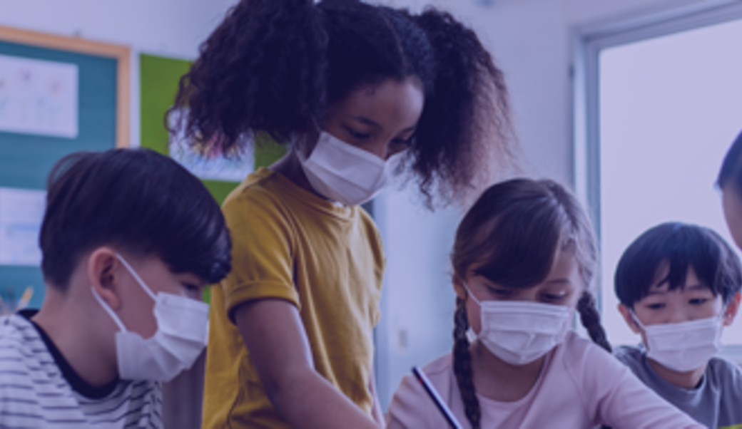 Kids in a classroom wearing masks