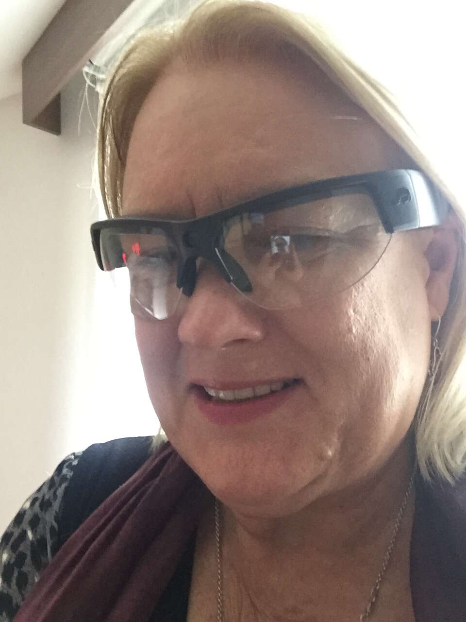 The author wearing the audio and video recording “glasses” used in the Ballarat East study, 2017.  Image: Kristal Buckley 