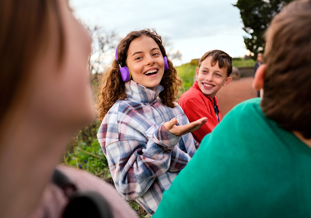 Children having a fun conversation outdoors