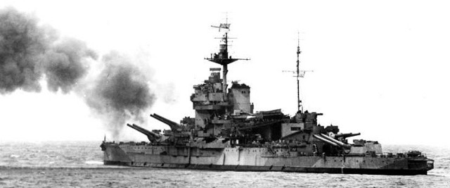 The H.M.S. Warspite of Britain's Royal Navy off the coast of Normandy, bombarding possible enemy locations.