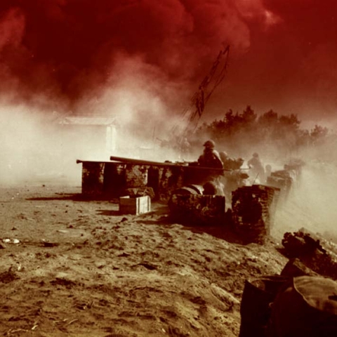 Paratroopers of teh 2nd RPC firing a 106 mm SR recoilless gun at an Egyptian resistance point on an Egyptian resistance point in Port Said 