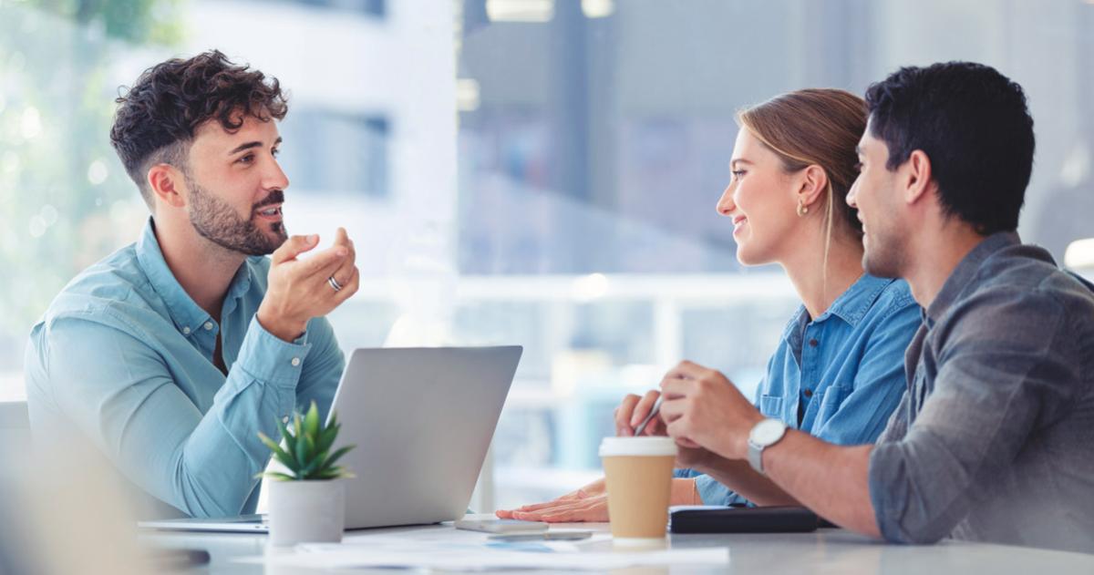 Young couple talking with an advisor