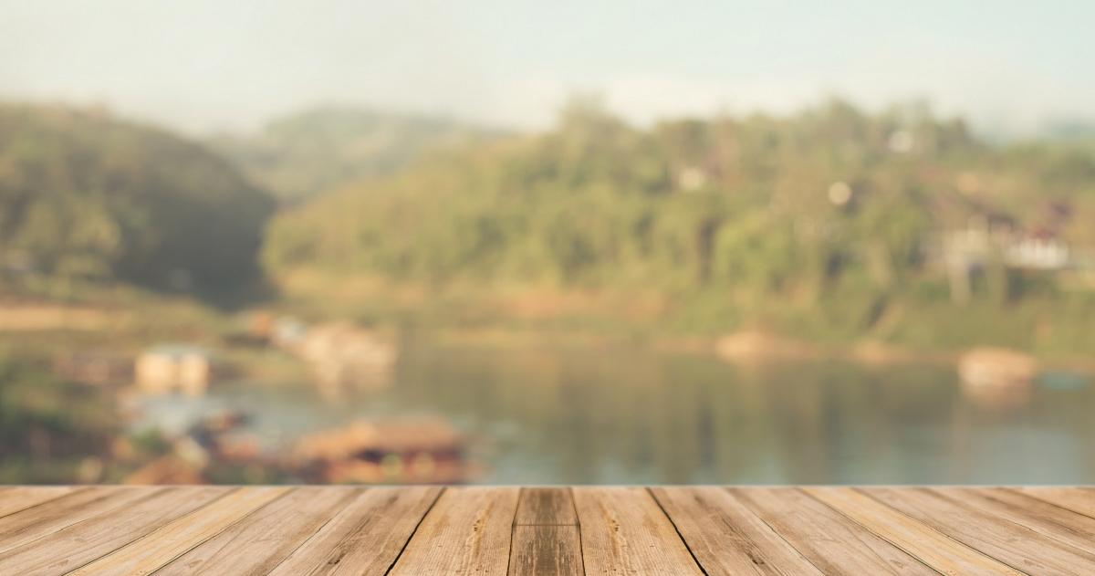 Image of a dock and water in the background