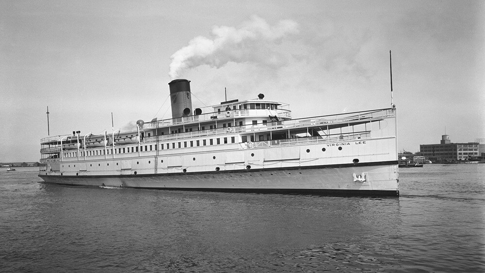 Starboard bow view of Virginia Lee coming into a harbor.