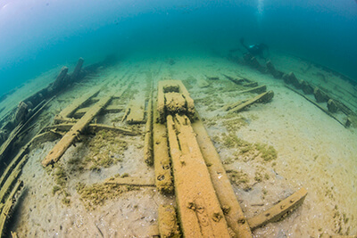 wood from a shipwreck underwater