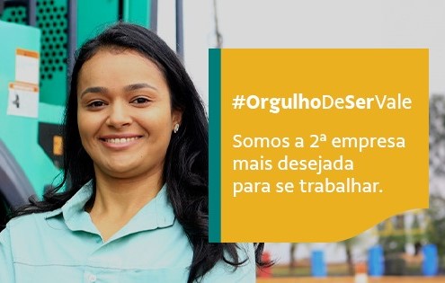 Imagem de uma funcionária sorrindo. Na frente está um box com amarelo, com a frase "#OrgulhoDeSerVale Somos a 2ª empresa mais desejada para se trabalhar" escrita em branco