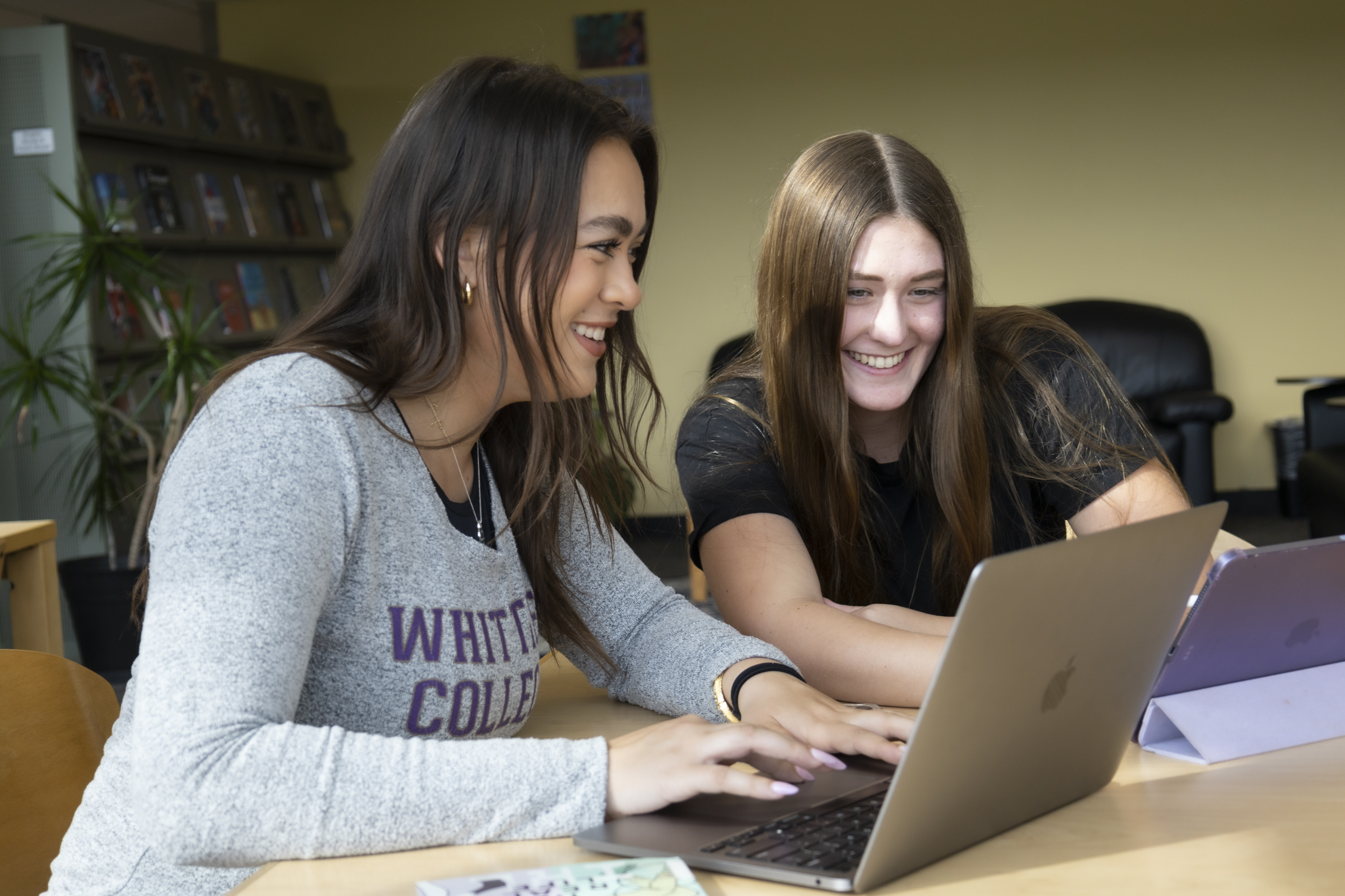 Two students in library