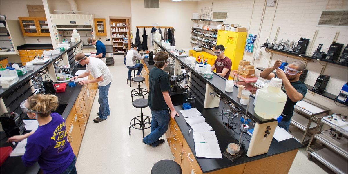 Students conduct experiments in a science lab