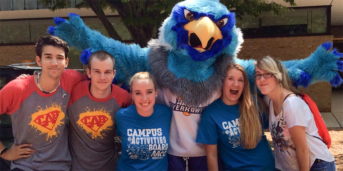 Students pose with Swoop on the quad.