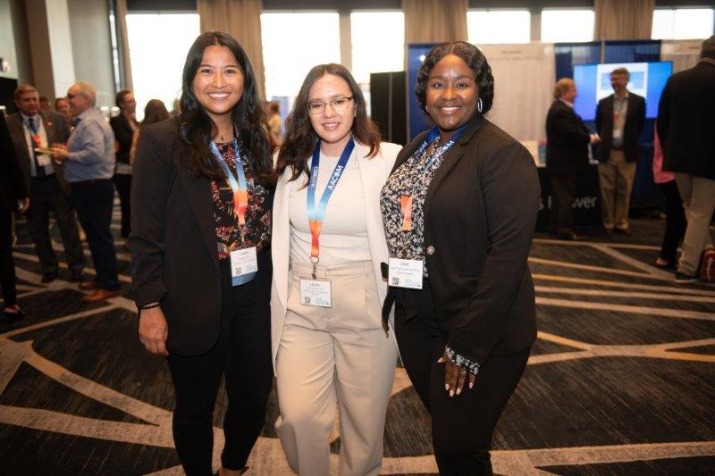 Three women attending Educating Leaders 2024