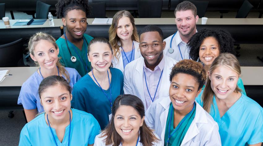 Group of medical students smile for camera