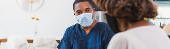 registered nurse meeting with patient at home