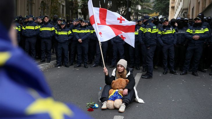 Opposition protesters rally outside Georgia’s parliament