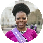 Woman wearing Alzheimer's advocate sash