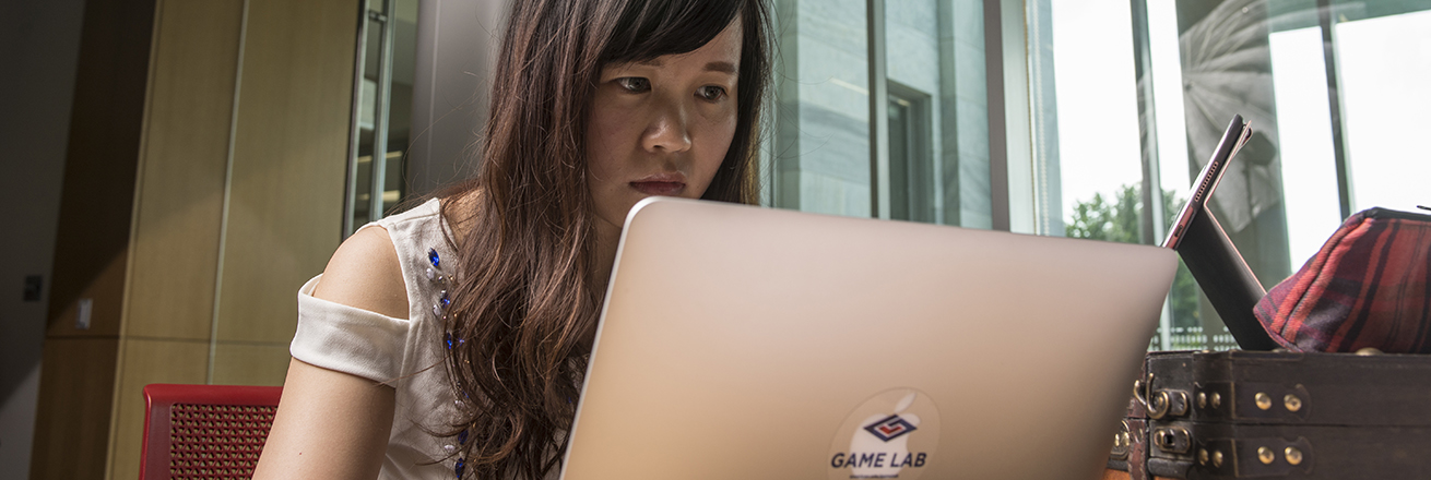 Game Lab student working on a laptop.