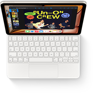 Top down view of iPad Air with Magic Keyboard in white.