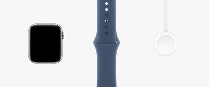 Sırayla dizili bir şekilde Apple Watch SE donanımının önden görünümü, yıldız ışığı renginde bir spor kordon ve Manyetik Şarj Aygıtı - USB‑C Kablosu.