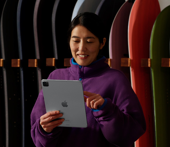 Small-business owner takes inventory on iPad.