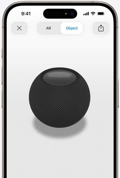 Keskiyö HomePod iPhonen näytöllä lisätyn todellisuuden näkymässä.