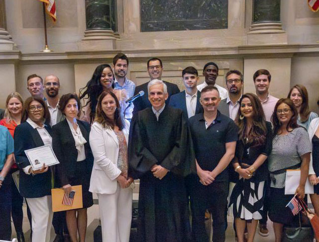 New citizens after naturalization ceremony in the National Archives Rotunda