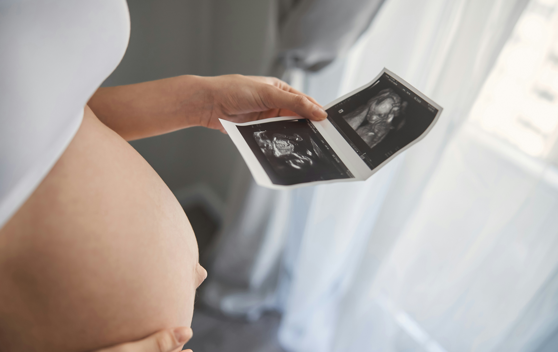 Woman speaking to doctor